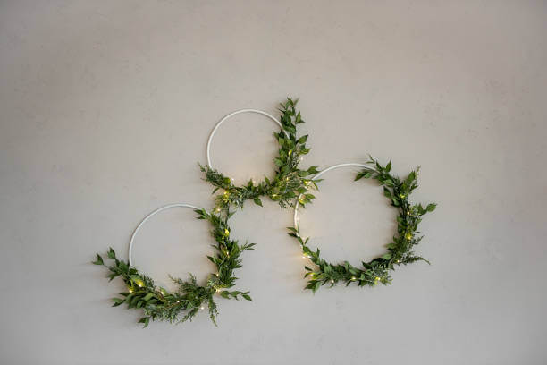 wreaths on grey concrete wall